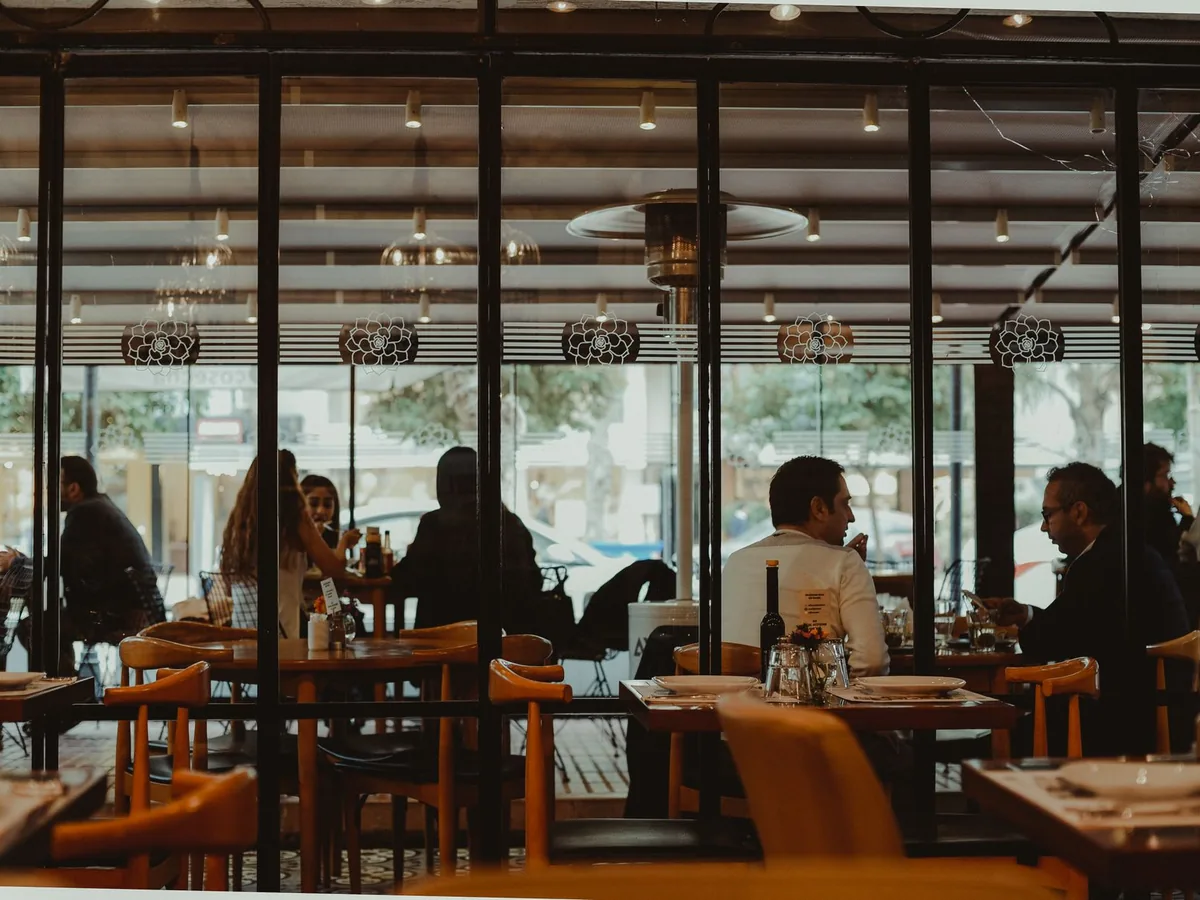 Guests dine together at a restaurant.